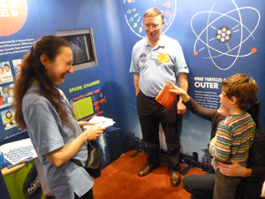 With visitors and helpers at ScienceLive, The Royal Society Summer Science Exhibition, 2011.