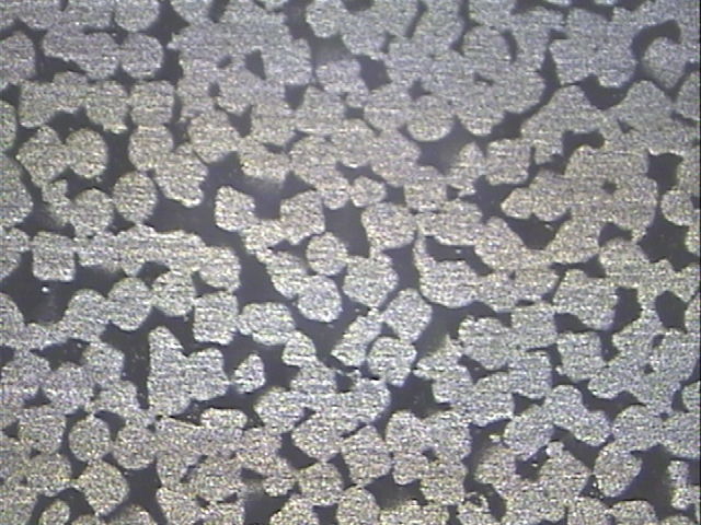 Left: magnified view of pad surface